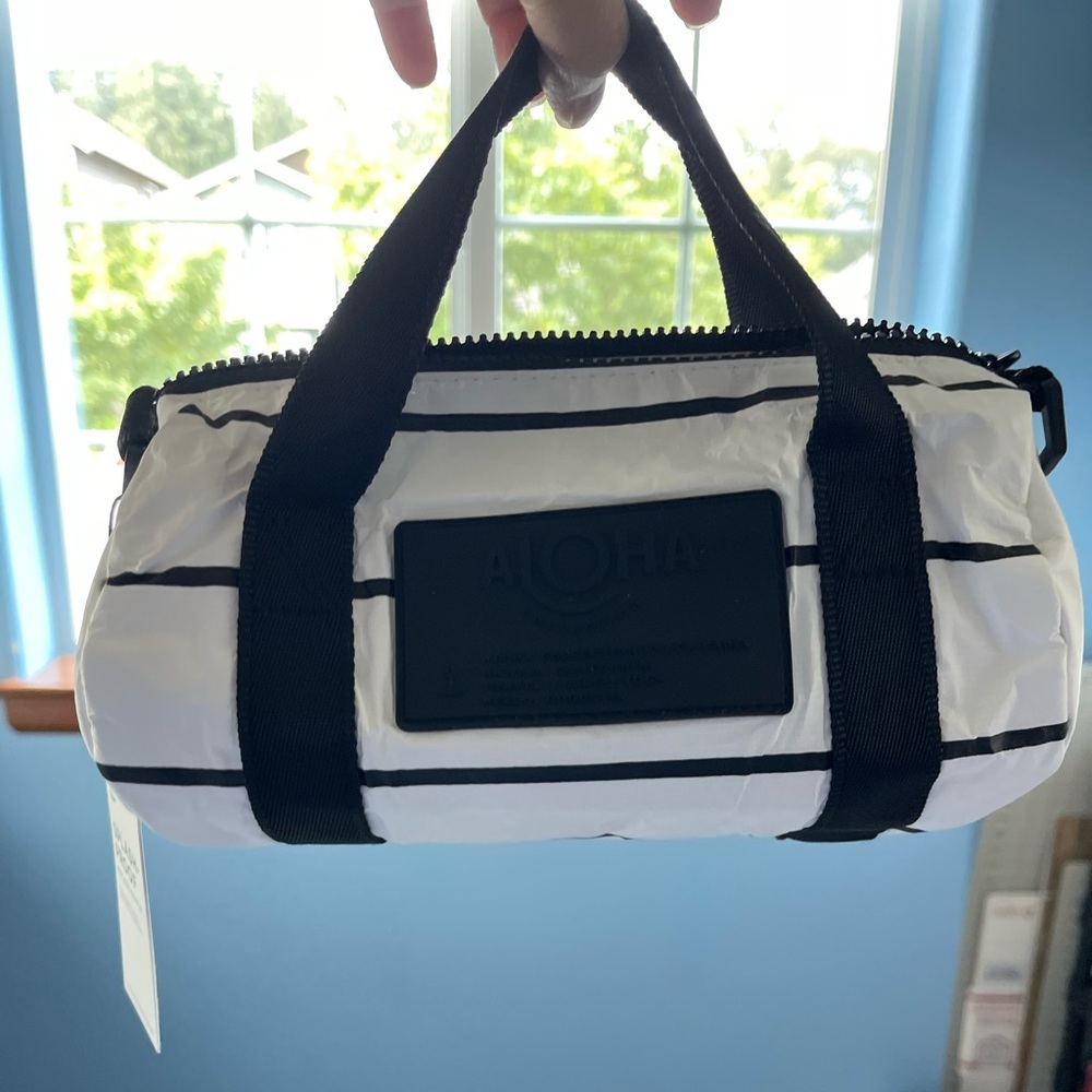 NWOT Aloha Collection mini mini duffle in pinstripe